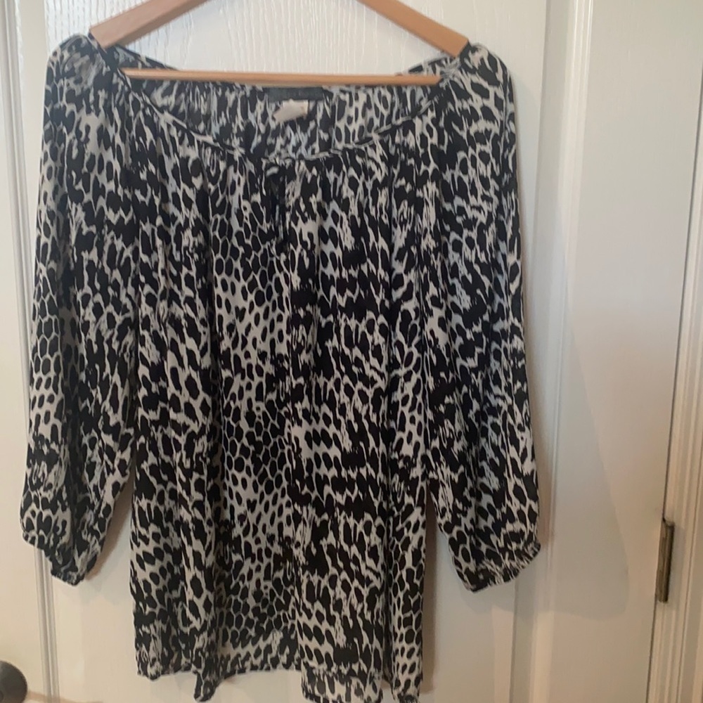 Animal print too like new 100% polyester sz large